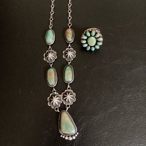 Green turquoise necklace and ring to match.